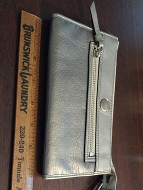 EUC Coach Metallic Silver Leather Wristlet with Striped Interior